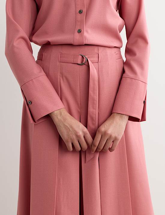 Wolrijke broekrok met wijde pijpen en riem