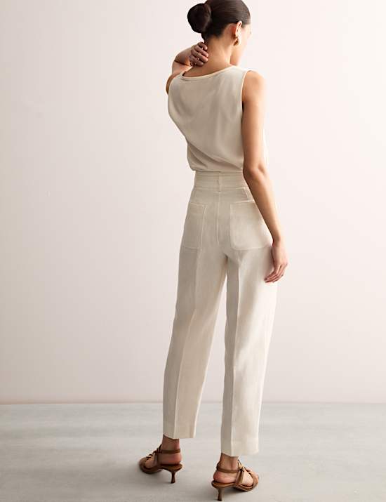 Παντελόνι με μπροστινή πιέτα και μπατζάκια που στενεύουν προς τα κάτω από 100% λινό