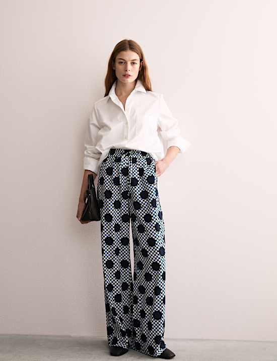 Broek van katoenmix met wijde pijpen en Ginham-stippen