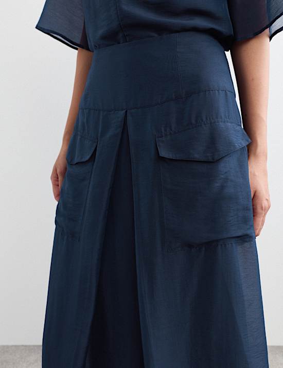 Jupe midi coupe droite en lyocell &agrave; devant pliss&eacute;