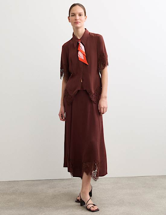 Jupe midi &agrave; empi&egrave;cement en dentelle