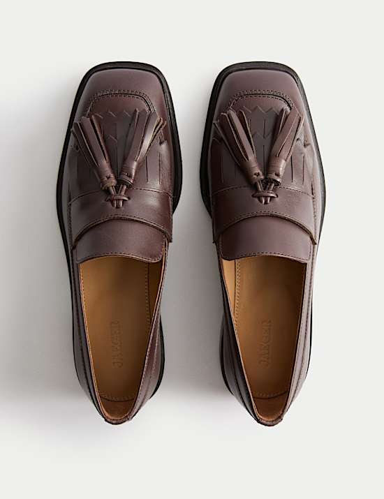 Mocassins en cuir à talons carrés, frange et pampilles