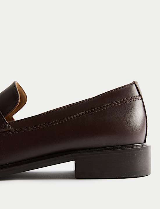 Mocassins en cuir à talons carrés, frange et pampilles