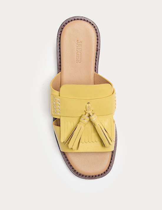 Mules mocassins plates en cuir &agrave; glands