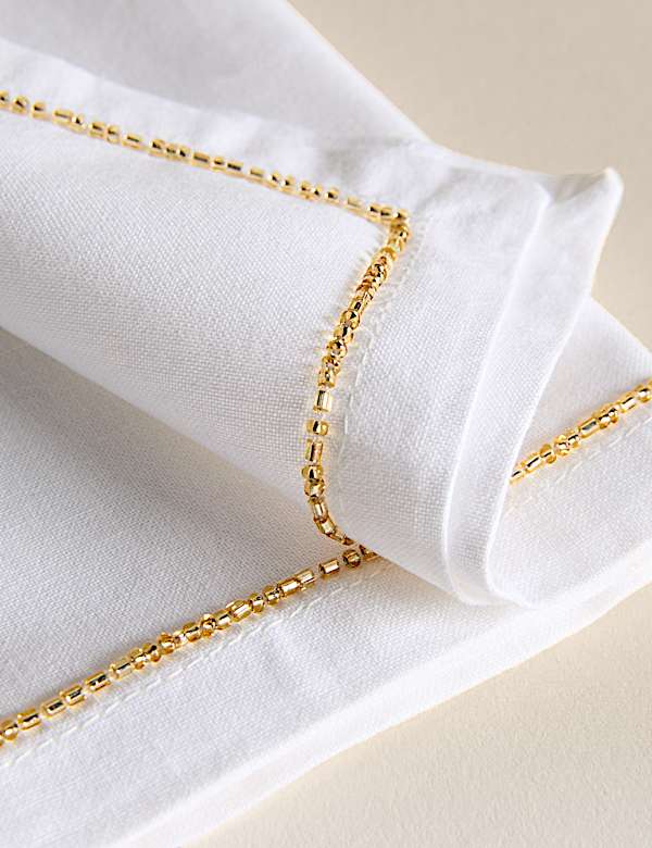 Pack de 4 servilletas 100 % algod&oacute;n con borde adornado - ES