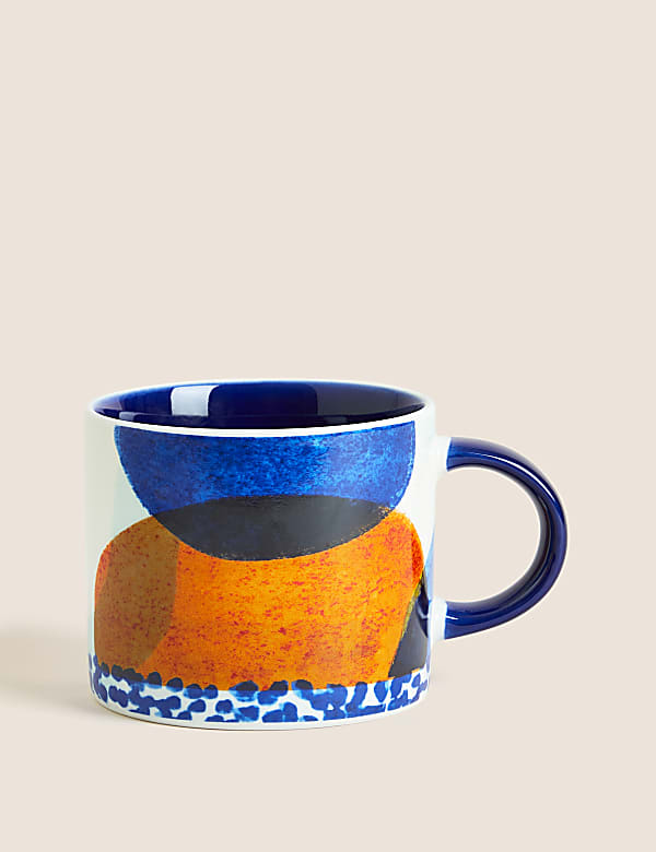 Taza de topos con diseno abstracto