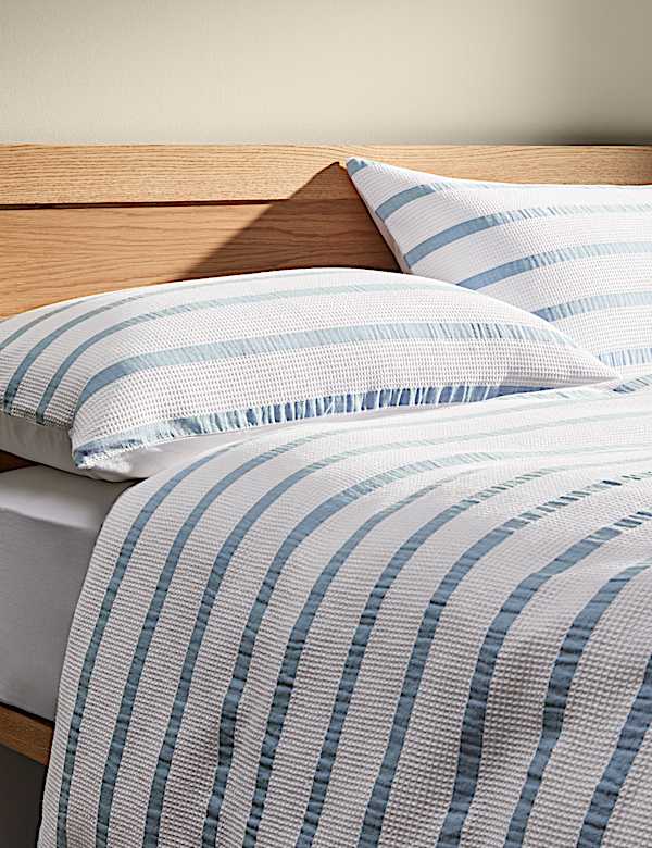 Ropa de cama gofrada 100 % algodón de rayas en contraste - ES