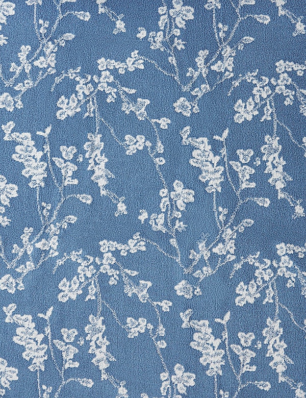 Superzachte handdoek van zuiver katoen met ingeweven bloemmotief - NL