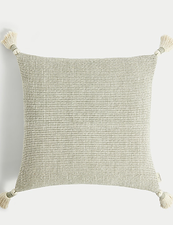 Cojín 100% algodón texturizado con borlas - US