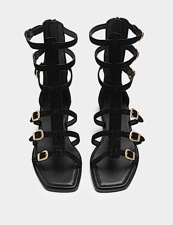 Sandalias romanas planas de ante a media pierna con hebilla - ES