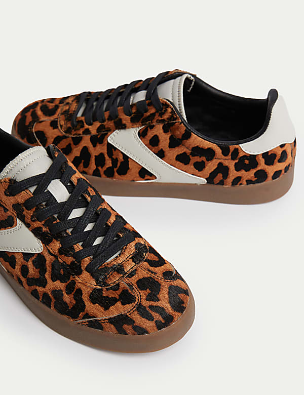 Zapatillas deportivas de piel con estampado de leopardo - ES