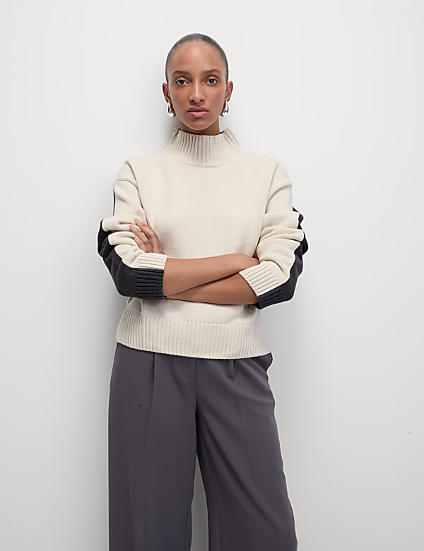 Su&eacute;ter de algod&oacute;n texturizado con cuello chimenea - ES