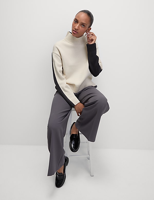 Su&eacute;ter de algod&oacute;n texturizado con cuello chimenea - ES