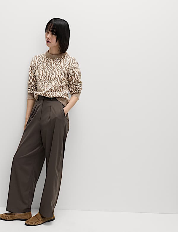 Suéter de cuello redondo con estampado animal en lana - ES