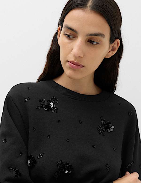 Sudadera de algod&oacute;n con adorno - US