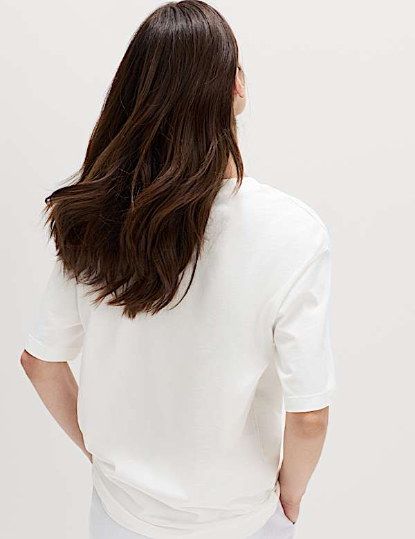 Oversized T-shirt van zuiver katoen met graphic - NL