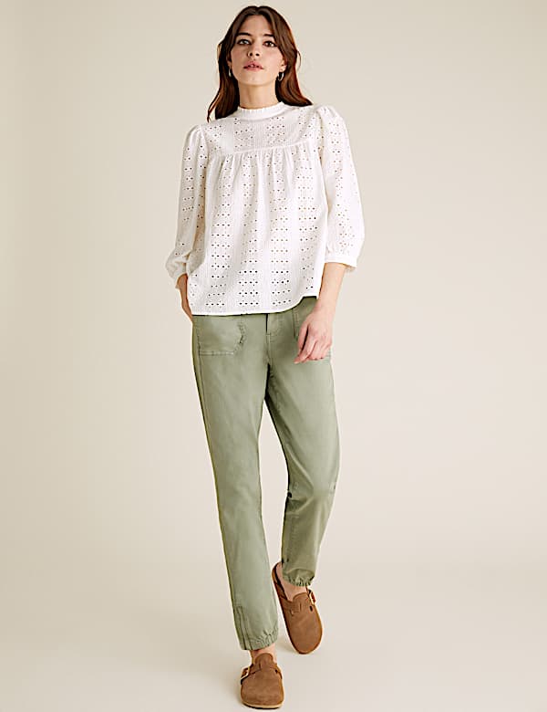 Kurzarmbluse aus reiner Baumwolle mit Lochstickerei - AT