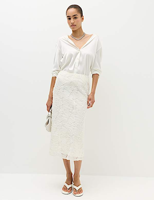 Jupe midi coupe &eacute;vas&eacute;e &agrave; motif textur&eacute; - BE
