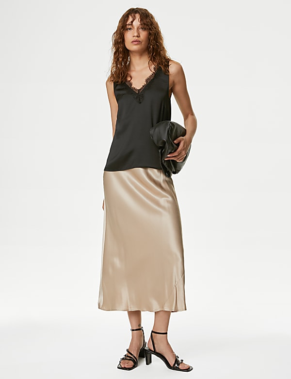 Top estilo camisola de escote en pico con detalle de encaje - ES