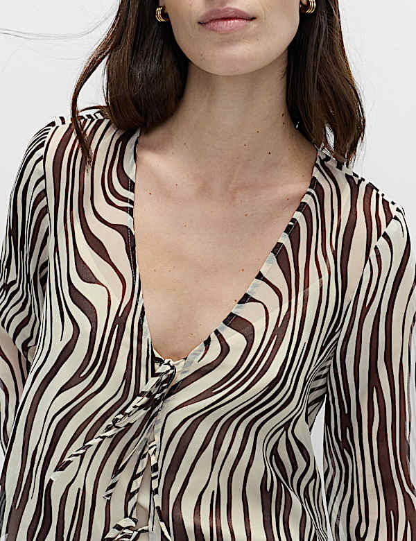 Zebra Print Tie Front Flute Sleeve Blouse