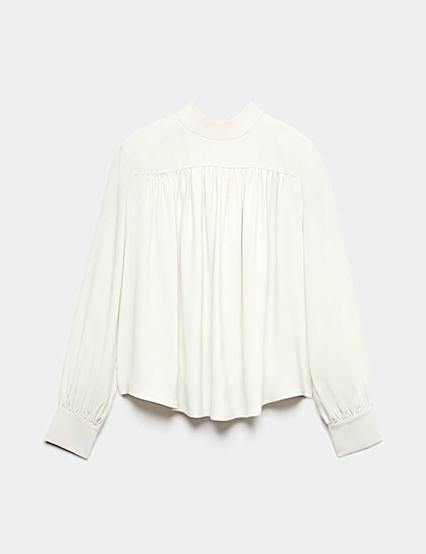 Blusa de manga blus&oacute;n con cuello alto - US
