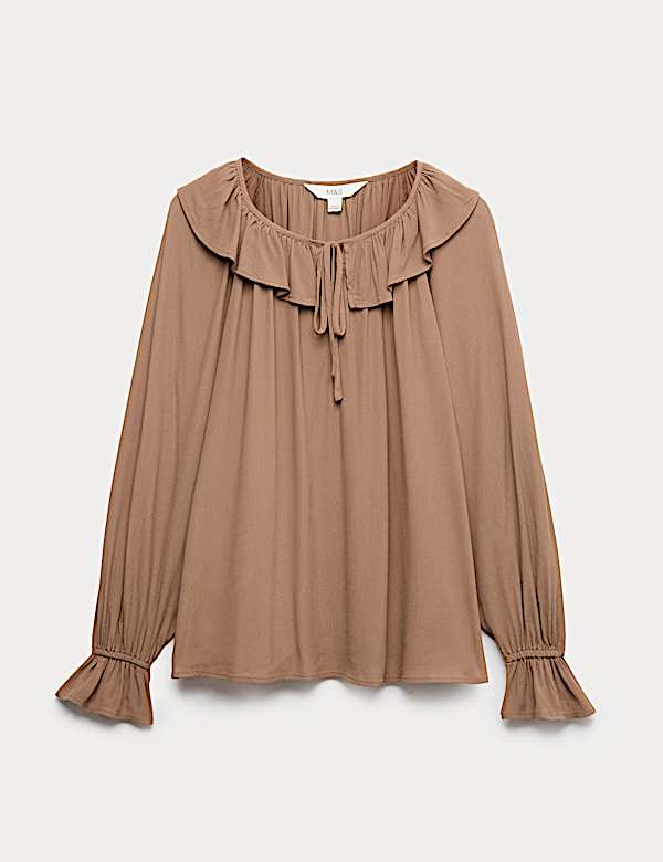 Blusa con detalle de volantes - ES