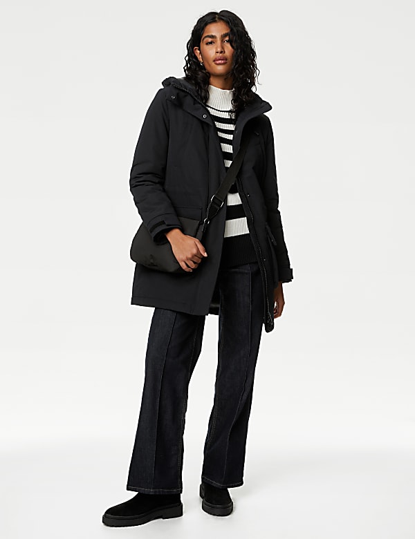 Black coat with fur hood and cuffs on sale