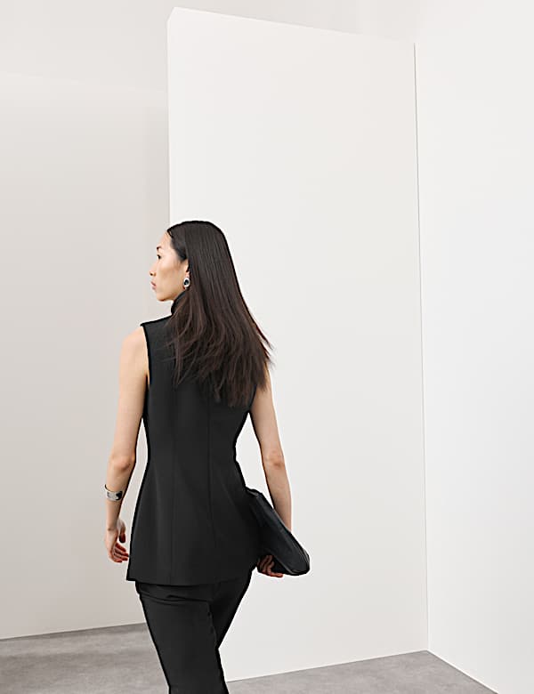 Aansluitende top met ronde hals van een wolmix - NL