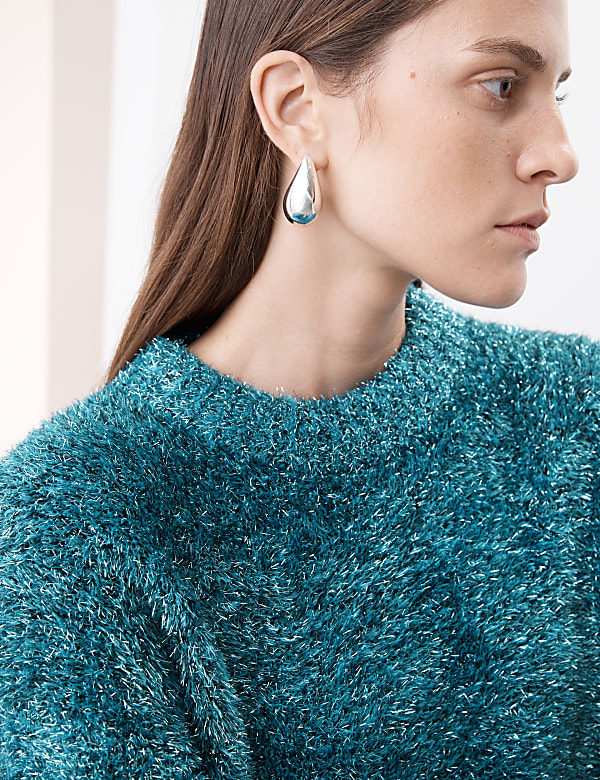 Jersey de escote cerrado con espumillón - US