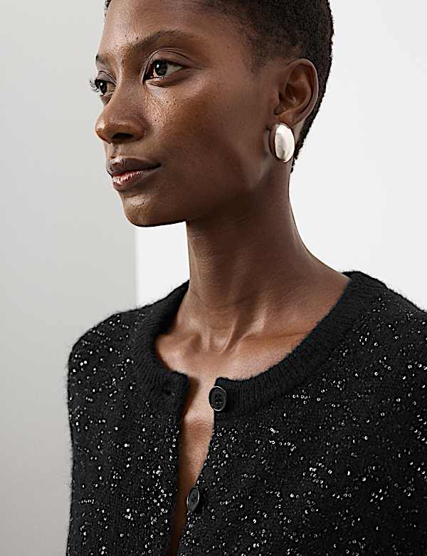 Vest met wol en lovertjes - NL