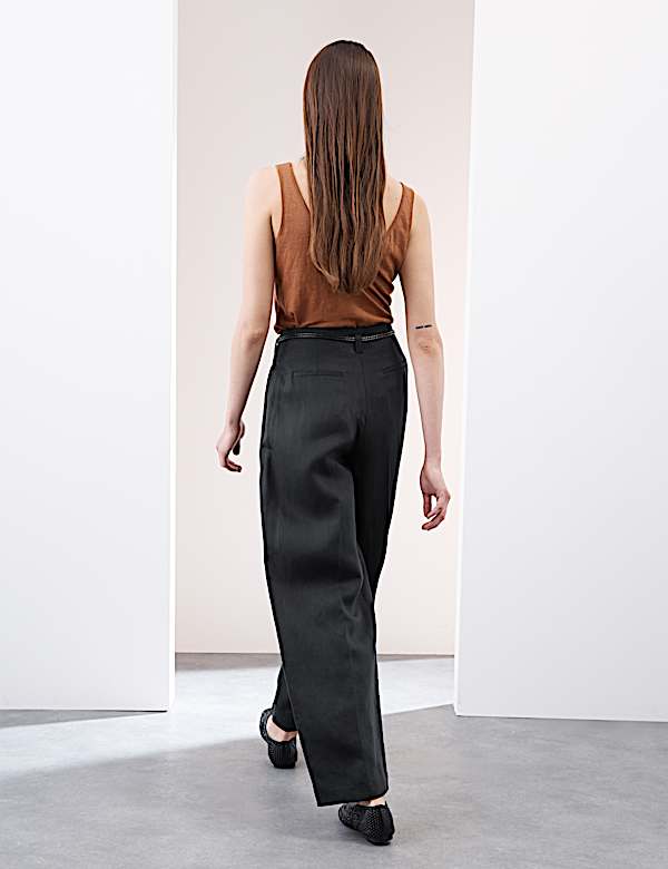 Pantalón tapered de lino con cinturón con pata zanahoria - ES