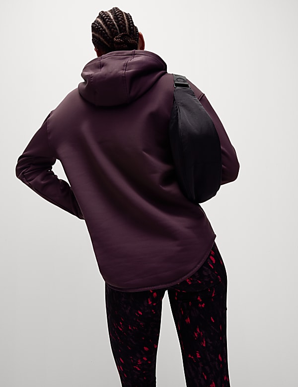 Ruimvallend capuchonvest met halflange rits en Ultraheat&trade; - BE