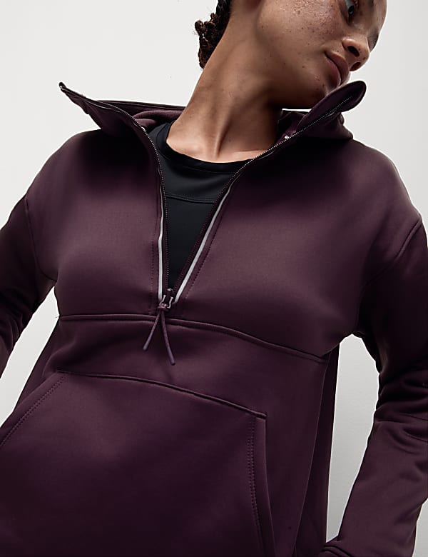 Ruimvallend capuchonvest met halflange rits en Ultraheat&trade; - BE