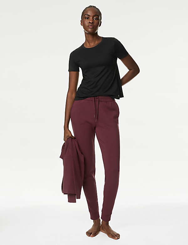 Yoga-T-shirt met lage ronde hals en wikkelstijl op de rug - NL