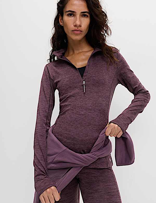 Top de running con media cremallera y cuello chimenea - US