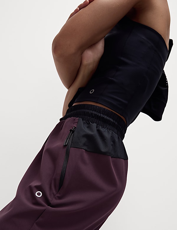 Taps toelopende joggingbroek met hoge taille en panden - NL