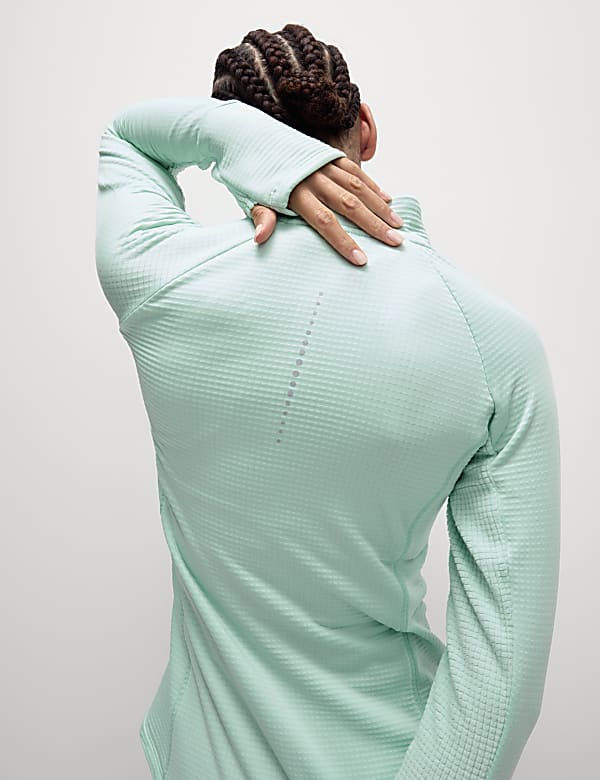 Ultraheat&trade; hardlooptop met opstaande kraag en halflange rits - NL