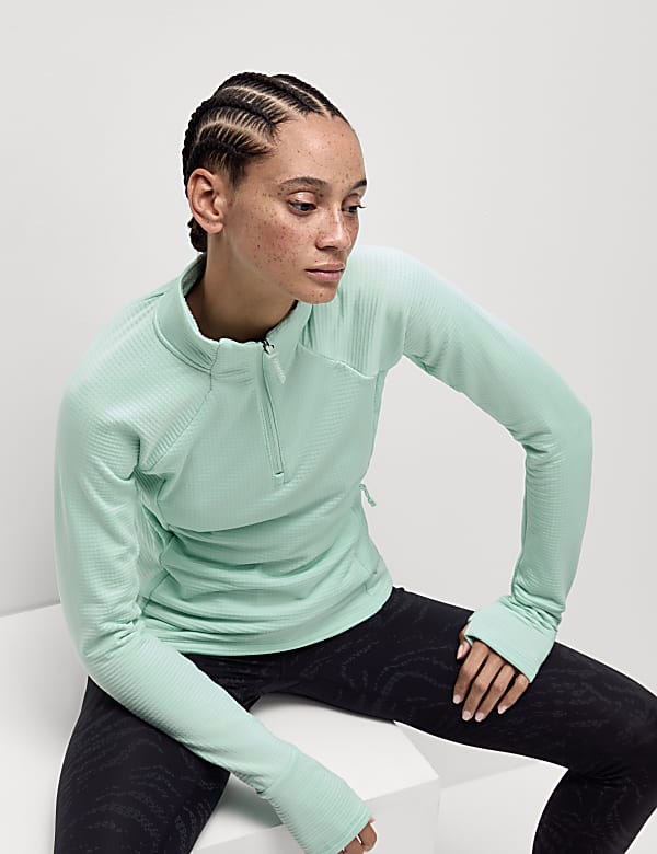 Ultraheat&trade; hardlooptop met opstaande kraag en halflange rits - NL