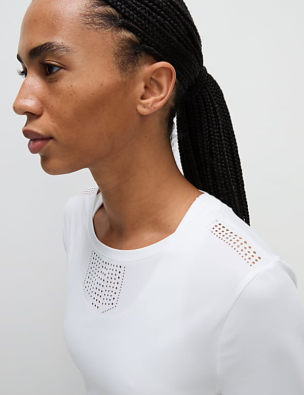 Camiseta informal de cuello redondo cortada con láser - US