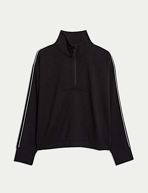 Top con media cremallera y cuello chimenea en modal - ES