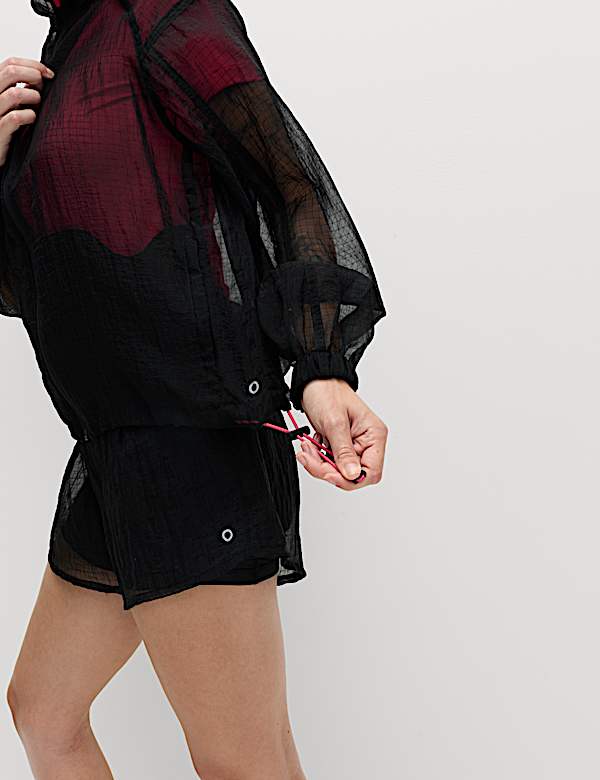 Chaqueta de deporte texturizada con volumen y cremallera transparente - ES