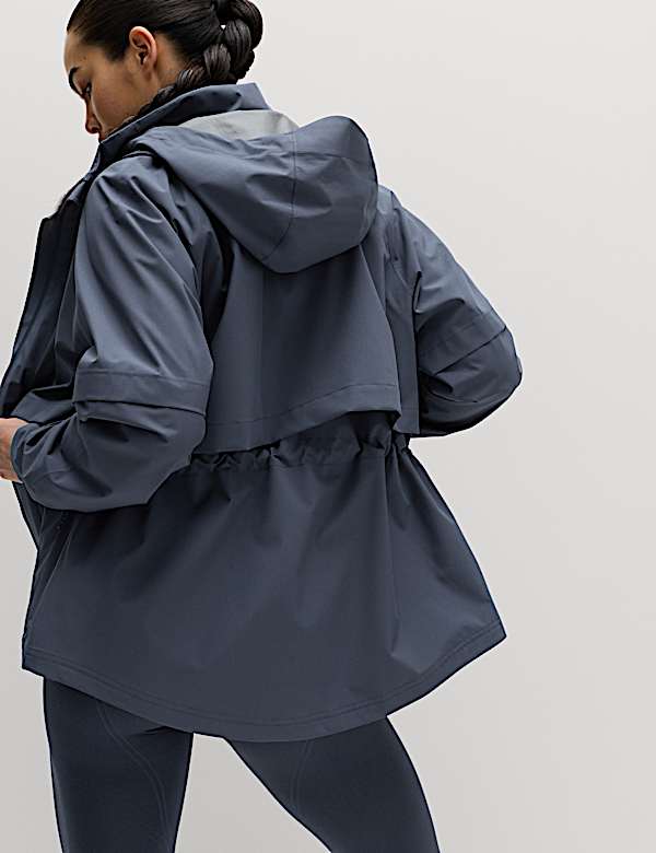Veste imperm&eacute;able coupe longue &agrave; capuche - LU