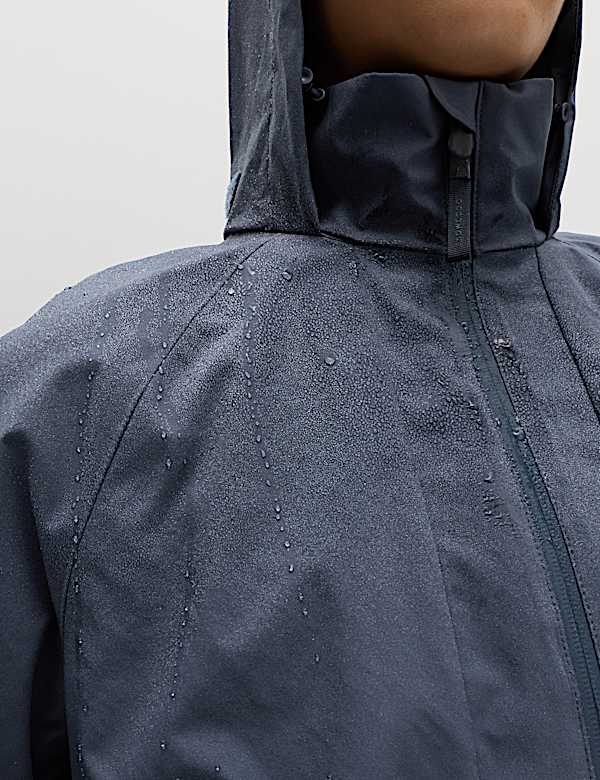 Veste imperm&eacute;able coupe longue &agrave; capuche - LU