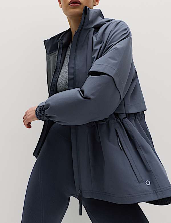 Veste imperm&eacute;able coupe longue &agrave; capuche - LU