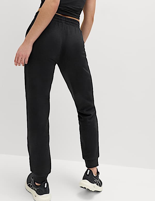 מכנסי טרנינג מבד עשיר בכותנה בגזרה גבוהה עם מכפלת קרסול צרה - IL