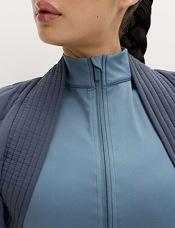 Nauwsluitende Go Balance-top met rits en geribd paneel - BE