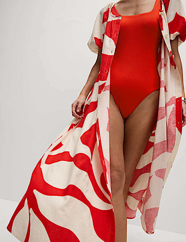 Traje de ba&ntilde;o texturizado con escote abierto - ES