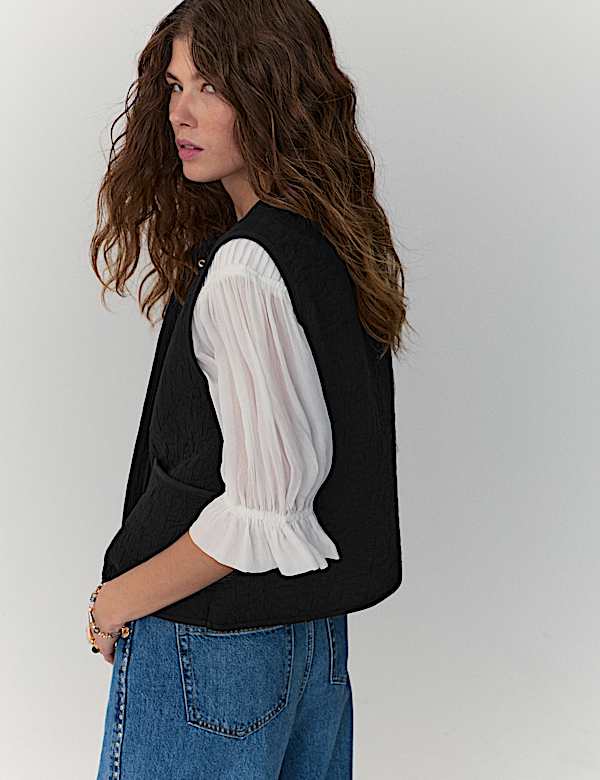 Chaleco acolchado sin cuello - US