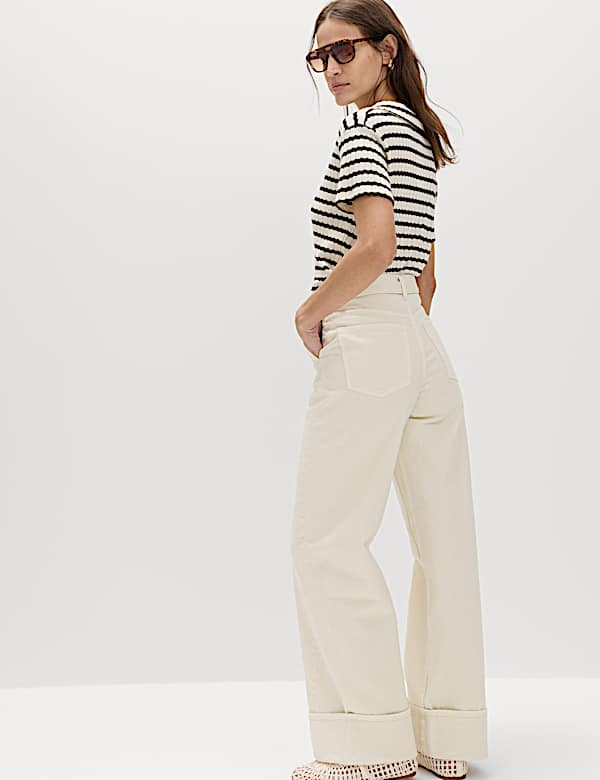 Jean large 100 % coton &agrave; revers avec ceinture - LU