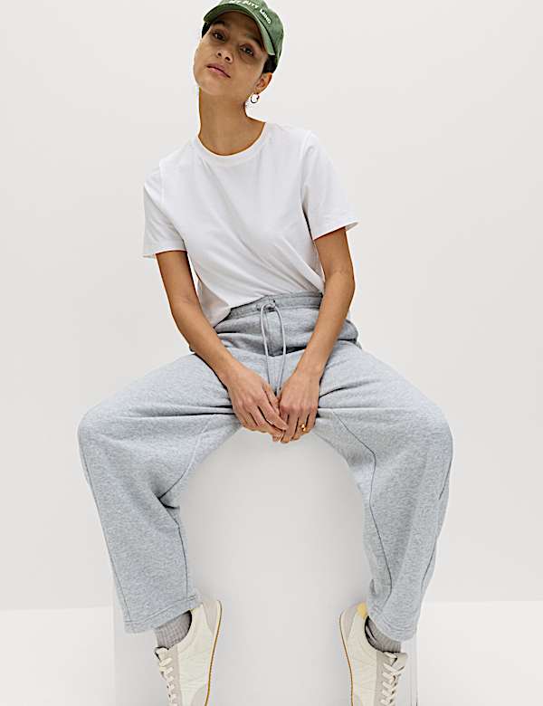 Tepl&aacute;ky ke kotn&iacute;kům s nohavicemi mrkv&aacute;čov&eacute;ho stylu a vysok&yacute;m pod&iacute;lem bavlny - CZ